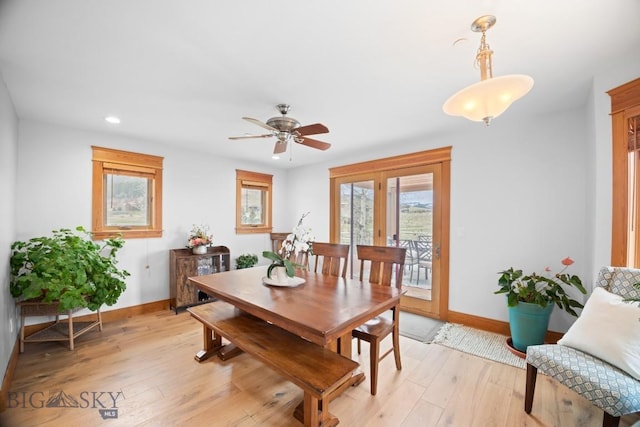 dining room with light wood-style floors, baseboards, ceiling fan, and recessed lighting