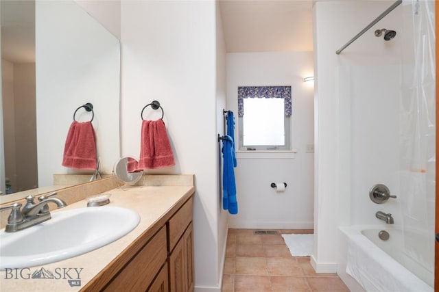 bathroom with tile patterned flooring, vanity, shower / bath combo with shower curtain, baseboards, and visible vents