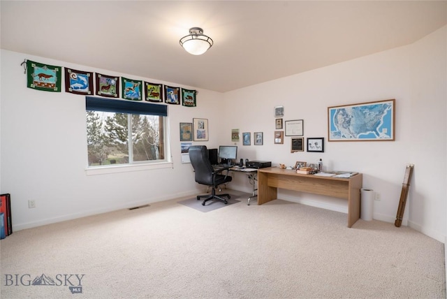 home office featuring baseboards, carpet, and visible vents