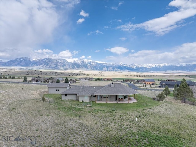 aerial view featuring a mountain view