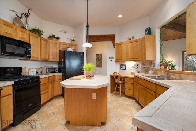 kitchen with a kitchen island, tile countertops, a sink, light tile patterned floors, and black appliances