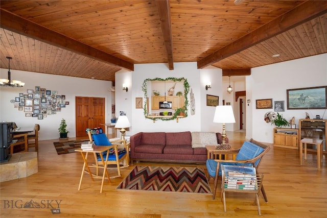 living room with an inviting chandelier, wooden ceiling, lofted ceiling with beams, and wood finished floors