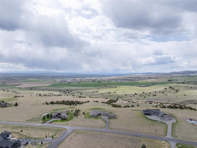 birds eye view of property featuring a rural view