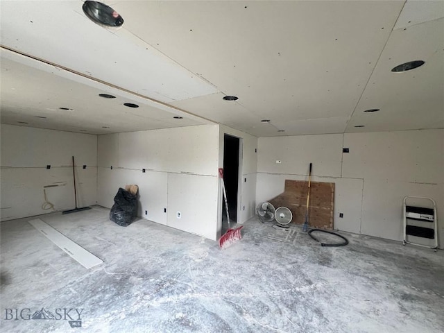 interior space with heating unit and concrete flooring