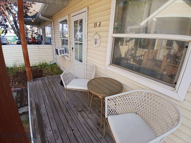 93 8th St Unit B, Belgrade, MT 59714 - wooden deck with cooling unit