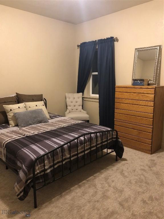 93 8th St Unit B, Belgrade, MT 59714 - view of carpeted bedroom