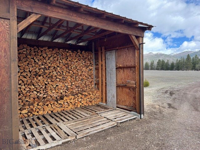 7510 Woodworth Rd, Ovando, MT 59854 - view of outbuilding featuring a mountain view