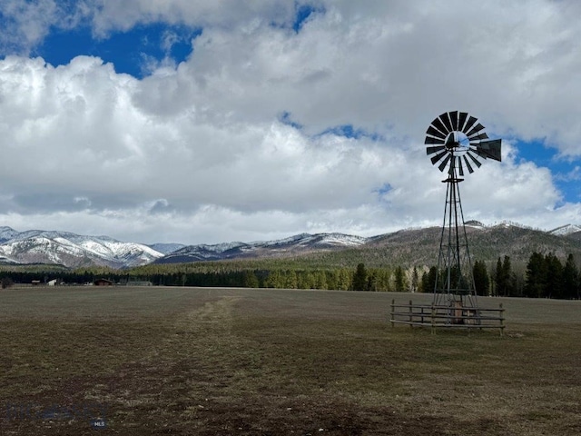 view of home's community featuring a rural view and a mountain view
