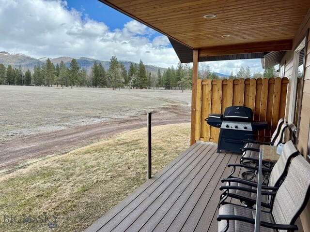 7510 Woodworth Rd, Ovando, MT 59854 - deck with area for grilling and a mountain view