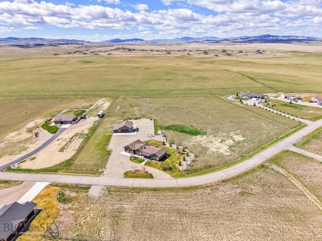 aerial view featuring a mountain view and a rural view