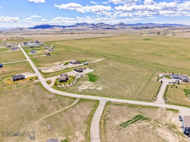 aerial view featuring a mountain view and a rural view