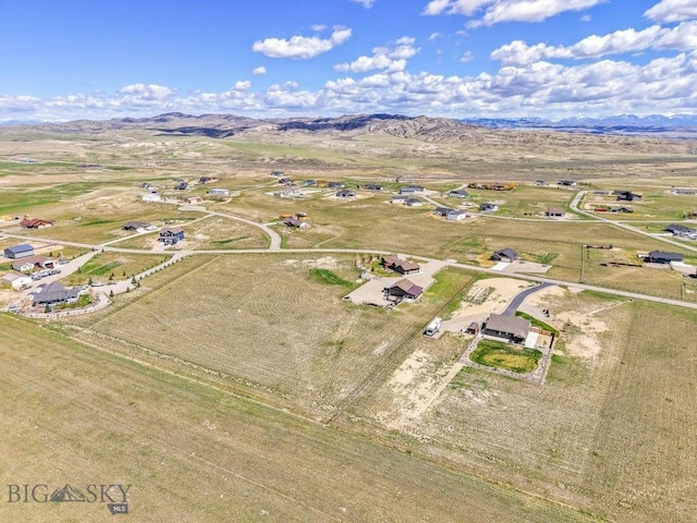 bird's eye view with a mountain view and a rural view