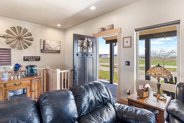living area with recessed lighting and plenty of natural light