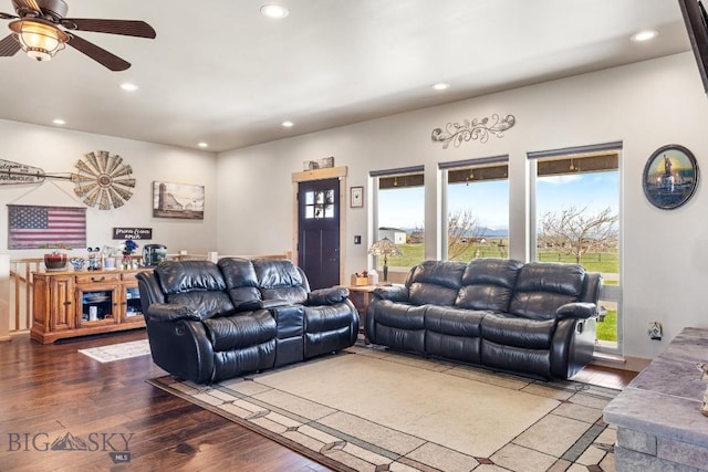 living area featuring recessed lighting and plenty of natural light