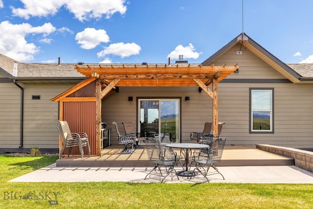 rear view of property featuring a patio and a pergola