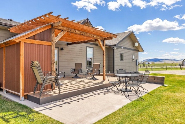 view of patio with a pergola, fence, and a mountain view
