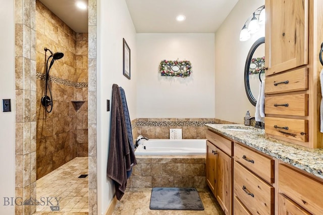 bathroom featuring recessed lighting, walk in shower, a bath, and vanity
