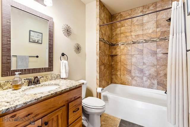 full bath featuring vanity, shower / tub combo with curtain, tile patterned floors, and toilet