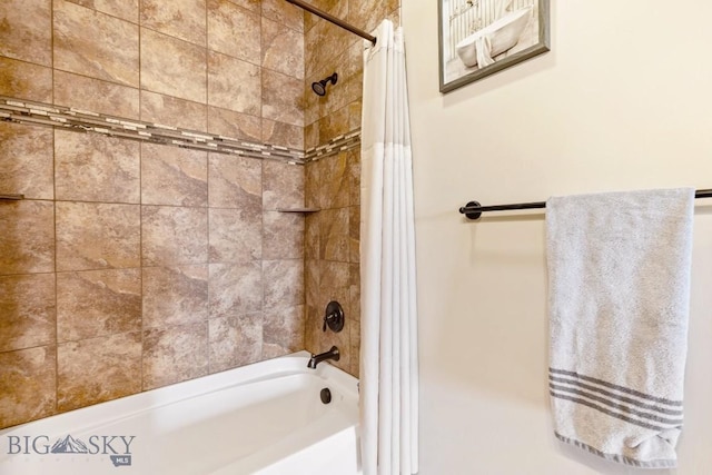 full bath featuring shower / tub combo with curtain