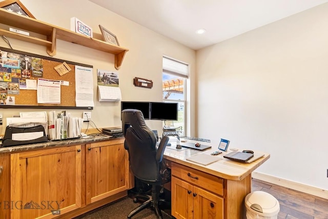 office featuring dark wood-type flooring, recessed lighting, and baseboards