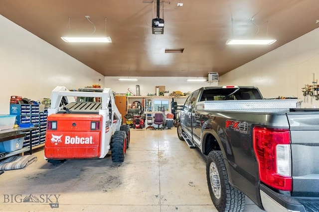 garage featuring a garage door opener