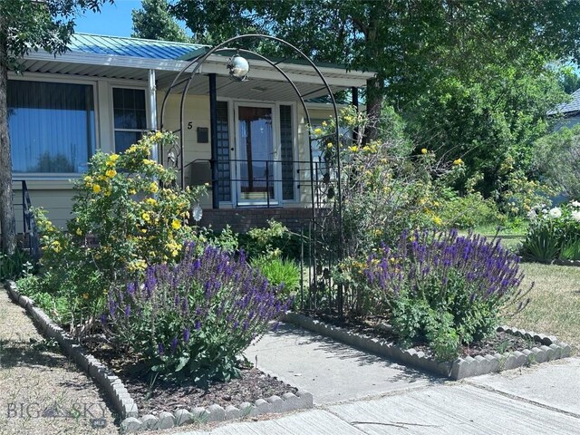 5 1st St W, Whitehall, MT 59759 - entrance to property with a metal roof