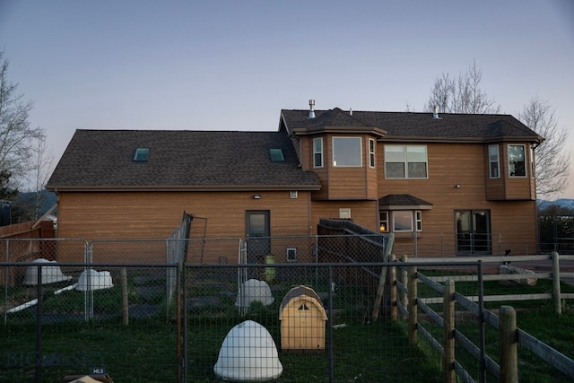 8265 Fowler Ln, Bozeman, MT 59718 - back of property featuring a shingled roof