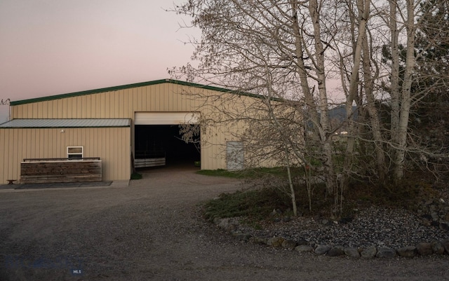 8265 Fowler Ln, Bozeman, MT 59718 - outdoor structure at dusk featuring an outbuilding
