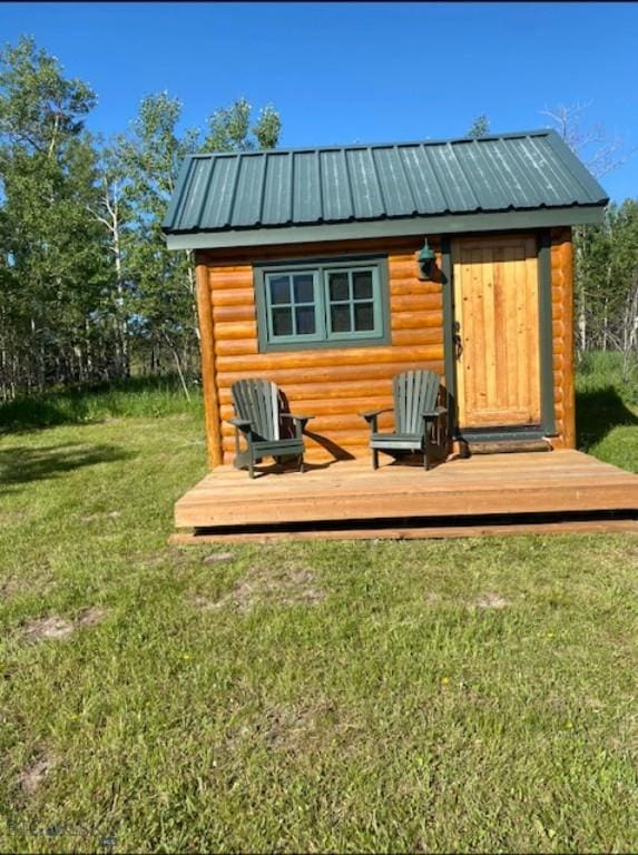 view of outbuilding with an outdoor structure