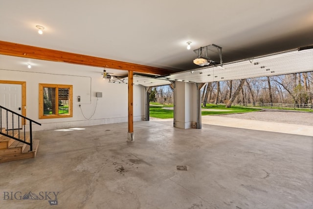 624 Rocking Horse Dr, Bozeman, MT 59718 - garage featuring a garage door opener