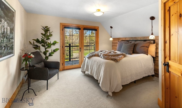 624 Rocking Horse Dr, Bozeman, MT 59718 - carpeted bedroom featuring access to outside and vaulted ceiling