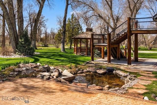 624 Rocking Horse Dr, Bozeman, MT 59718 - view of yard featuring a wooden deck, a gazebo, and stairway