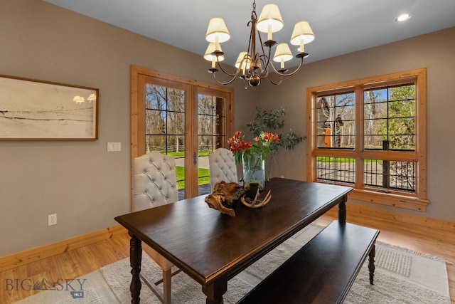 624 Rocking Horse Dr, Bozeman, MT 59718 - dining area featuring recessed lighting, baseboards, a notable chandelier, and wood finished floors