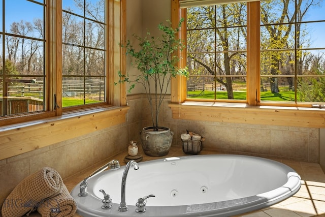 624 Rocking Horse Dr, Bozeman, MT 59718 - bathroom with a whirlpool tub and plenty of natural light