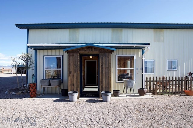 view of front of home with fence