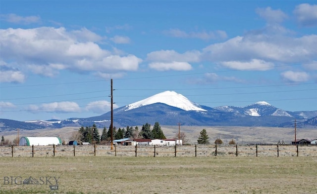 property view of mountains featuring a rural view
