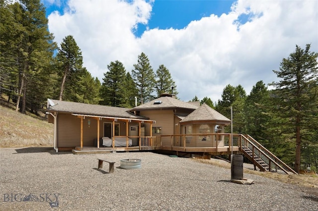 189 Quinn Creek Rd, Bozeman, MT 59715 - rear view of property with a gazebo and a wooden deck