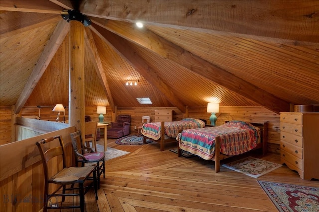 189 Quinn Creek Rd, Bozeman, MT 59715 - bedroom with wooden walls, lofted ceiling with beams, and wood-type flooring