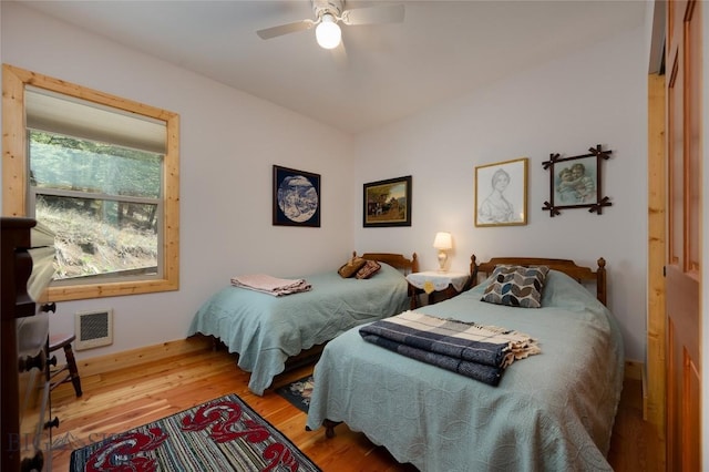 189 Quinn Creek Rd, Bozeman, MT 59715 - bedroom featuring ceiling fan, visible vents, and wood finished floors