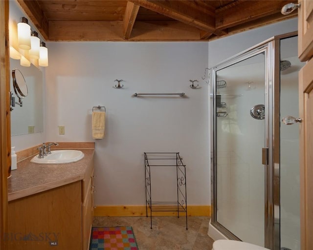 189 Quinn Creek Rd, Bozeman, MT 59715 - full bath featuring a stall shower, baseboards, vanity, and wood ceiling