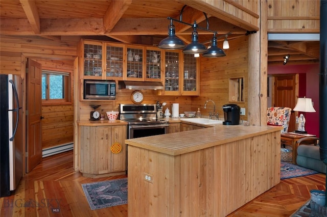 189 Quinn Creek Rd, Bozeman, MT 59715 - kitchen featuring a sink, freestanding refrigerator, beamed ceiling, stainless steel electric stove, and a baseboard radiator