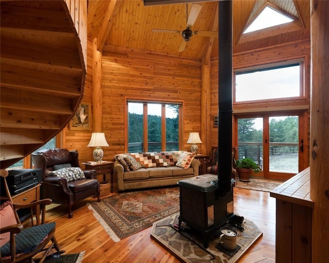 189 Quinn Creek Rd, Bozeman, MT 59715 - living room featuring plenty of natural light, wood walls, and high vaulted ceiling