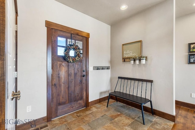 14549 High Flat Rd, Bozeman, MT 59718 - foyer with stone finish floors and recessed lighting