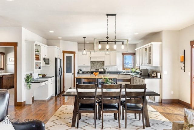 14549 High Flat Rd, Bozeman, MT 59718 - dining room with wood finished floors and recessed lighting
