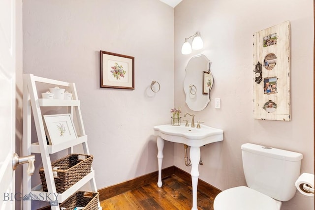 14549 High Flat Rd, Bozeman, MT 59718 - bathroom with wood finished floors and toilet