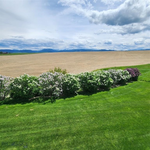 14549 High Flat Rd, Bozeman, MT 59718 - view of grassy yard featuring a rural view and a mountain view