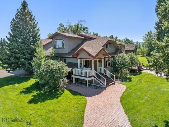 381 Bozeman Trail Rd, Bozeman, MT 59715 - craftsman-style house with a porch and a front yard