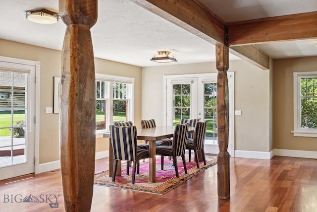 381 Bozeman Trail Rd, Bozeman, MT 59715 - dining area with baseboards, french doors, and wood finished floors