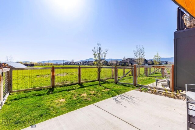 view of patio / terrace featuring fence