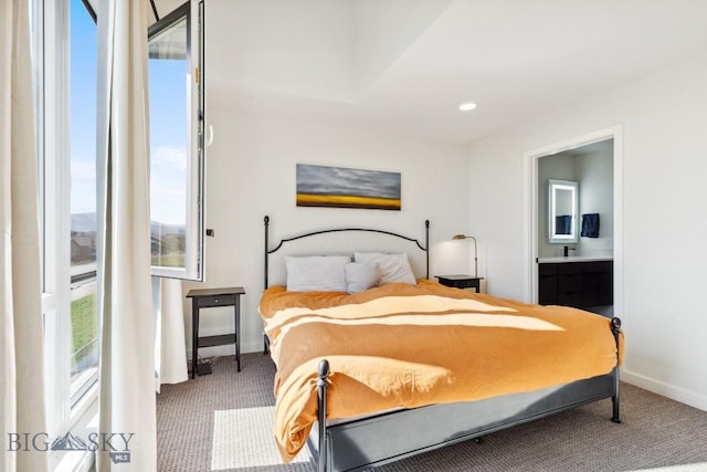 bedroom with recessed lighting, baseboards, and carpet floors